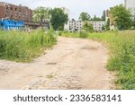 Small photo of Mitte, Berlin, Germany - July 21, 2023: An empty construction site on Koepernicker Strasse awaits pending development