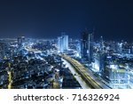 Tel Aviv Skyline At Night, Skyscraper and Ayalon Freeway - Toned In Blue