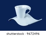 a modern white cup and saucer... | Shutterstock . vector #9672496