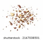 Wafers are explosive into pieces, with a chocolate splash isolated on a white background