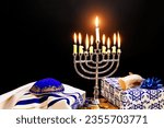 Small photo of Jewish holiday joy kindling hanukkah menorah candles on holy hanukkiah in jew home