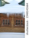 Rustic House With Icicles...