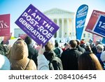 Small photo of WASHINGTON, DC, USA â€“ DECEMBER 1, 2021: Protesters rally outside the Supreme Court as the court revisits Roe v. Wade and the issue of abortion rights in Washington, DC on December 1, 2021