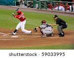 Small photo of WASHINGTON - AUGUST 14: Roger Bernadina of the Washington Nationals swings at a pitch in the Nationals' home game against the Arizona Diamondbacks on August 14, 2010 in Washington.