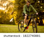Handsome Young Man Riding Ebike ...