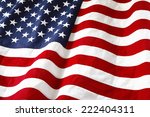 closeup of ruffled american flag | Shutterstock . vector #222404311