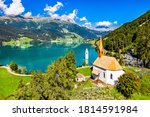 Small photo of St. Anna Chapel and Submerged Bell Tower of Curon at Graun im Vinschgau on Lake Reschen in South Tyrol, Italy