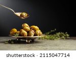 Small photo of Spicy green olives are poured with olive oil with spices. Copy space.