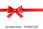 Red ribbon bow on white...
