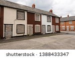 Two rows of derelict houses