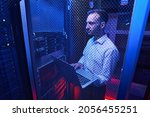 Small photo of Professional system administrator maintaining data security in colocation center