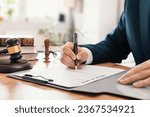 Small photo of Notary public working in the office. Lawyer or attorney concept