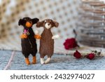 Small photo of couple of bonded dogs dachshund toy with yarn and knitting accessories