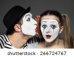 Male Mime Sharing Secret With...