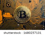 A Golden Coin With Bitcoin...