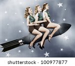 Three Women Sitting On A Rocket