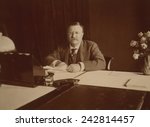 President Theodore Roosevelt (1858-1919), at his desk, 1907.