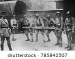 Small photo of French soldiers requisition iron pipe in Ruhr, extracting German payment of WW1 reparations, 1923-25