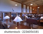 Small photo of Rochester, NY - August 2022: Elegant wood panelled study hall at the University of Rochester's library.