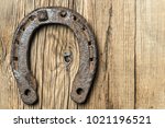 Old Rusty Horseshoe On A Old...