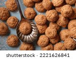 pile of cookie amaretti with spoon - traditional Italian pastry - closeup