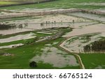 Farm paddocks partially underwater after massive flooding