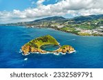 Small photo of Aerial shot, drone point of view of picturesque Islet of Vila Franca do Campo. Sao Miguel island, Azores, Portugal. Heart carved by nature. Bird eye view. Travel attraction and natural wonders concept
