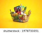 Shopping basket full of variety of grocery products, food and drink on yellow background. 3d illustration