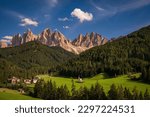 panorama view of the dolomites in val di funes, the Odle with the village of Santa Maddalena below, Italy