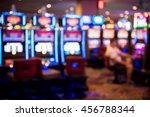 Blurry image of slots machines at the Casino