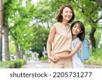 Small photo of young asian mother and daughter , School bag