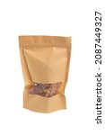 Small photo of Dog food - pieces of dried beef offal (trachea) in the craft package isolated on white background. Natural chewing treats.