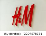Small photo of Grodno, Belarus - April 06, 2022: Close up shot of HM logo on HM Store Upfront in Triniti shopping mall.