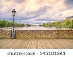 Love padlocks on Pont des Arts bridge, Seine river in Paris. France, Europe.