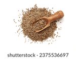 Small photo of A pile of Organic Pearl Millet (Pennisetum glaucum) or Bajra with a wooden scoop, isolated on a white background. Top view