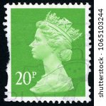 Small photo of UNITED KINGDOM - CIRCA 1996: stamp printed in Great Britain shows head of Queen Elizabeth II.; Scott MH211 20p bright green; circa 1996