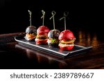 set mini hamburgers, mini burgers on plate