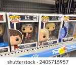 Small photo of Los Angeles, CA - Dec 17, 2023: Funko Pop bobble heads of ET movie characters, Elliott and Gertie.