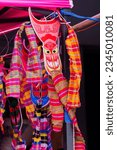 Small photo of LOEI-THAILAND-JUNE 24 : Detail of ghost mask for Phi Ta Khon Festival in the Dan Sai District, Loei, June 24, 2023, Loei Province, Thailand.