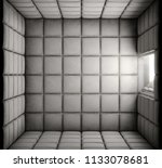 An Empty White Padded Cell With ...