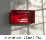 An empty red emergency box with an in case of emergency breakable glass on the front mounted on a wall - 3D render
