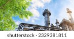 Small photo of Green Industry. Eco Power Plant. Petrochemical Industrial Factory saving environment ozone low carbon footprint wide for banner.