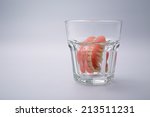 A Set Of Dentures In A Glass Of ...