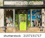 Small photo of CHAGRIN FALLS, OH, USA - APRIL 30, 2022: The Little Ba-bet shop, a boutique clothing store for babies and children, is part of the business scene in this small NE Ohio village near Cleveland.