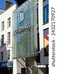 Small photo of EXETER, UK - AUGUST 22, 2023 - View of the Guildhall Shopping Centre glass front along High Street in the city centre, Exeter, Devon, UK, Europe, August 22, 2023.