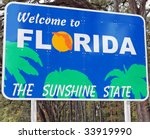 A Welcome Sign At The Florida...