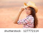 Young American Cowgirl Woman...
