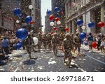 Soldiers in tickertape parade ...