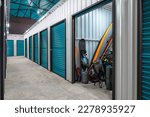 Small photo of Outdoors activity items seen through the open door of the self storage unit. Rental Storage Units