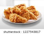 crispy fried chicken in a white table